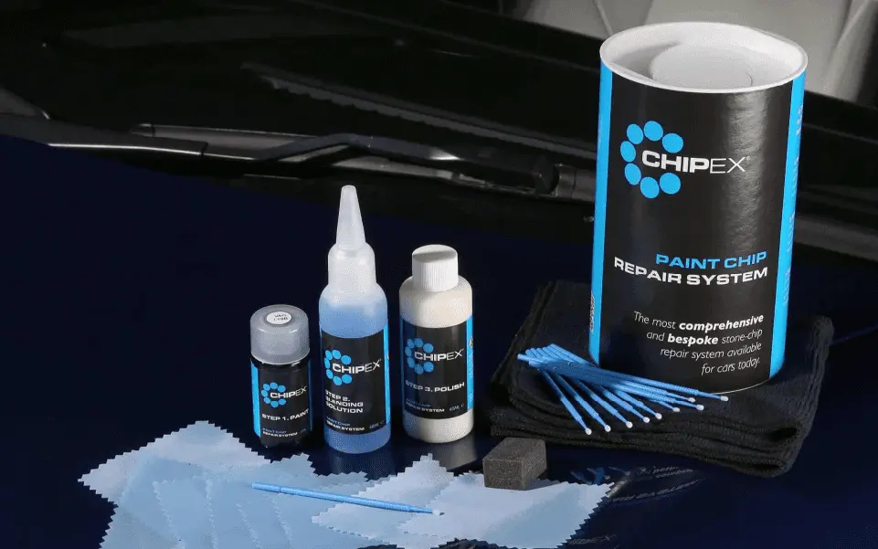 All items found in the Chipex Kit on top of the hood of a black car